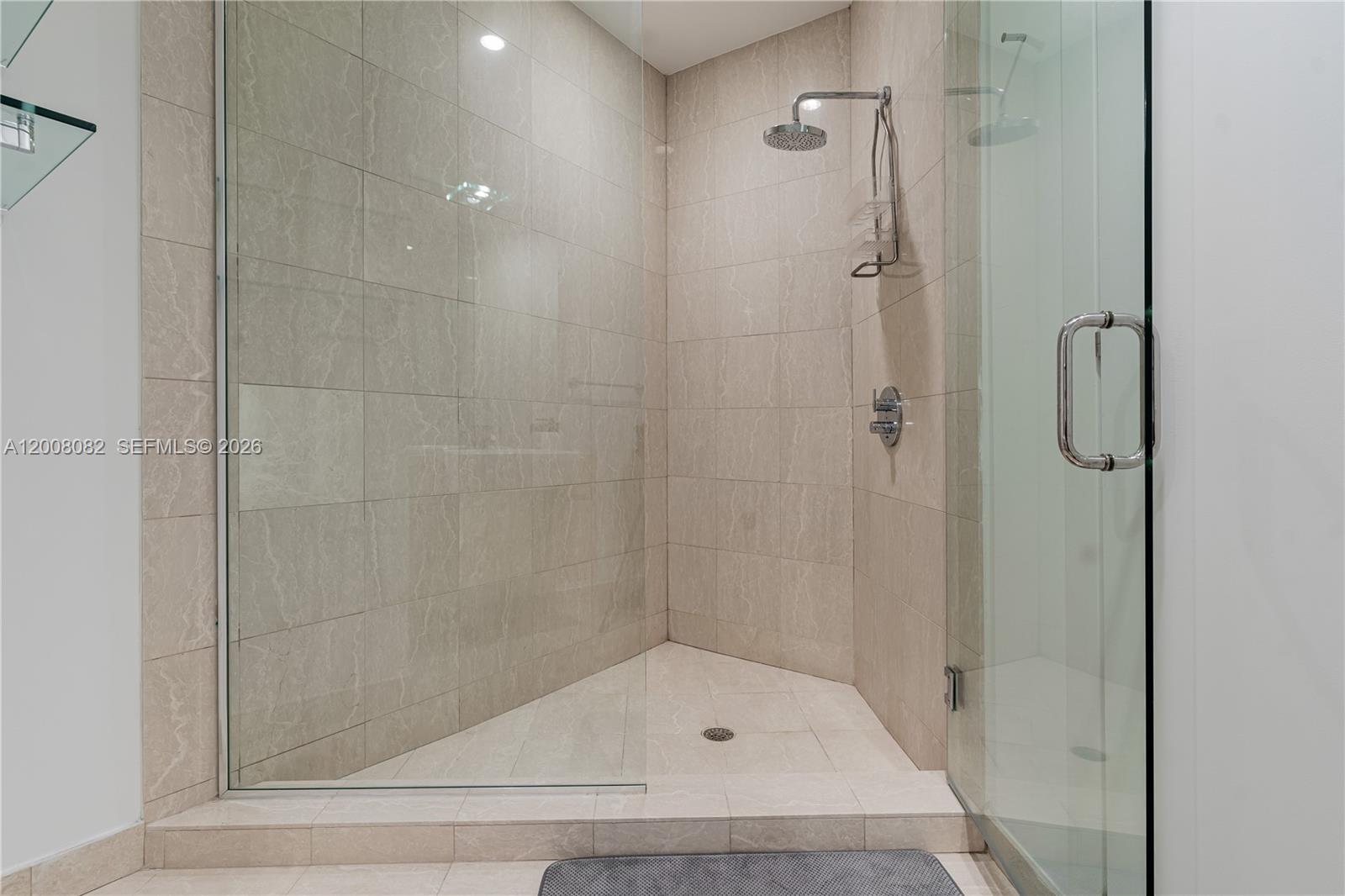 200 Biscayne Blvd Way, Unit 5001 Miami, FL 33131 - Photo 21 of 53 a bathroom with a shower