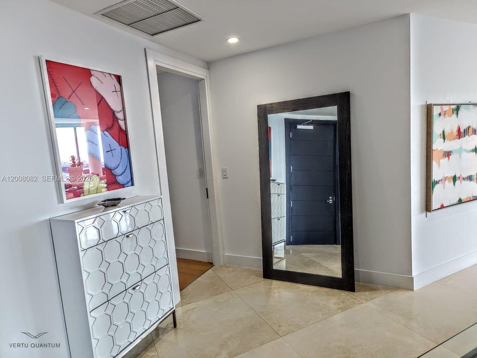 200 Biscayne Blvd Way, Unit 5001 Miami, FL 33131 - Photo 32 of 53 a view of an entryway with a hallway