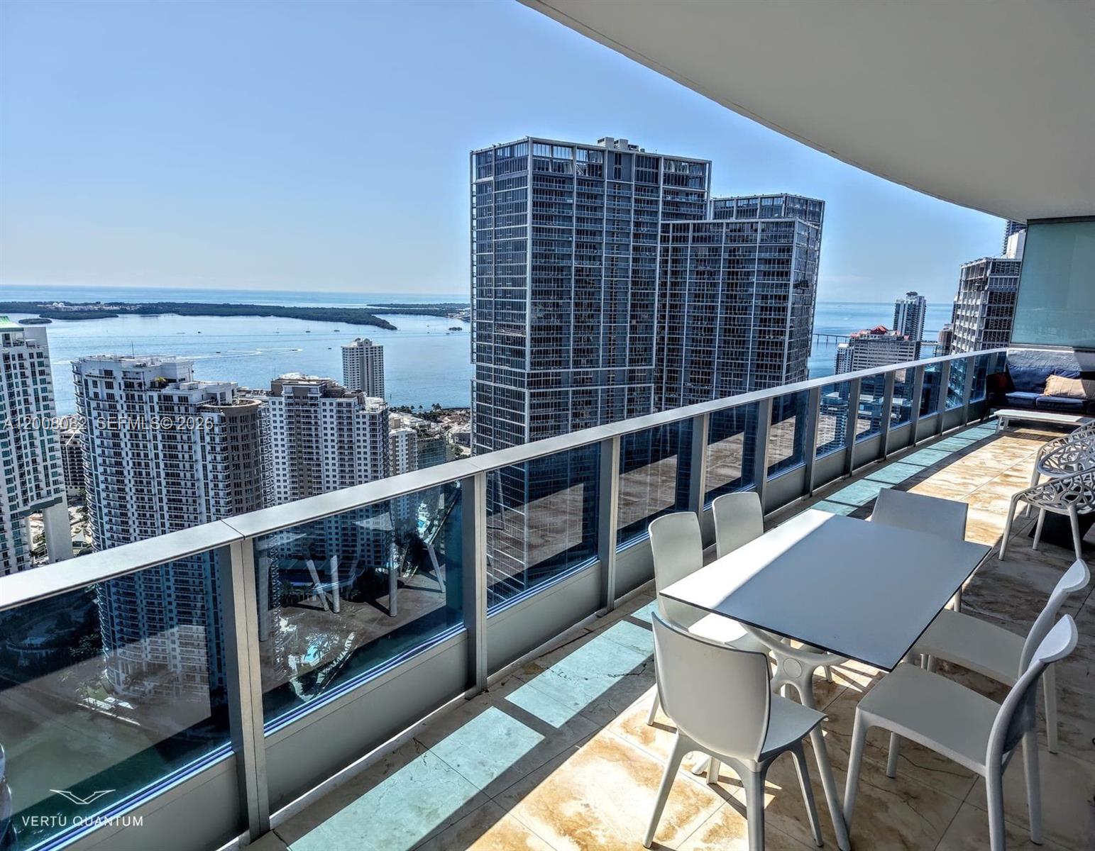 200 Biscayne Blvd Way, Unit 5001 Miami, FL 33131 - Photo 44 of 53 a view of a balcony with chairs