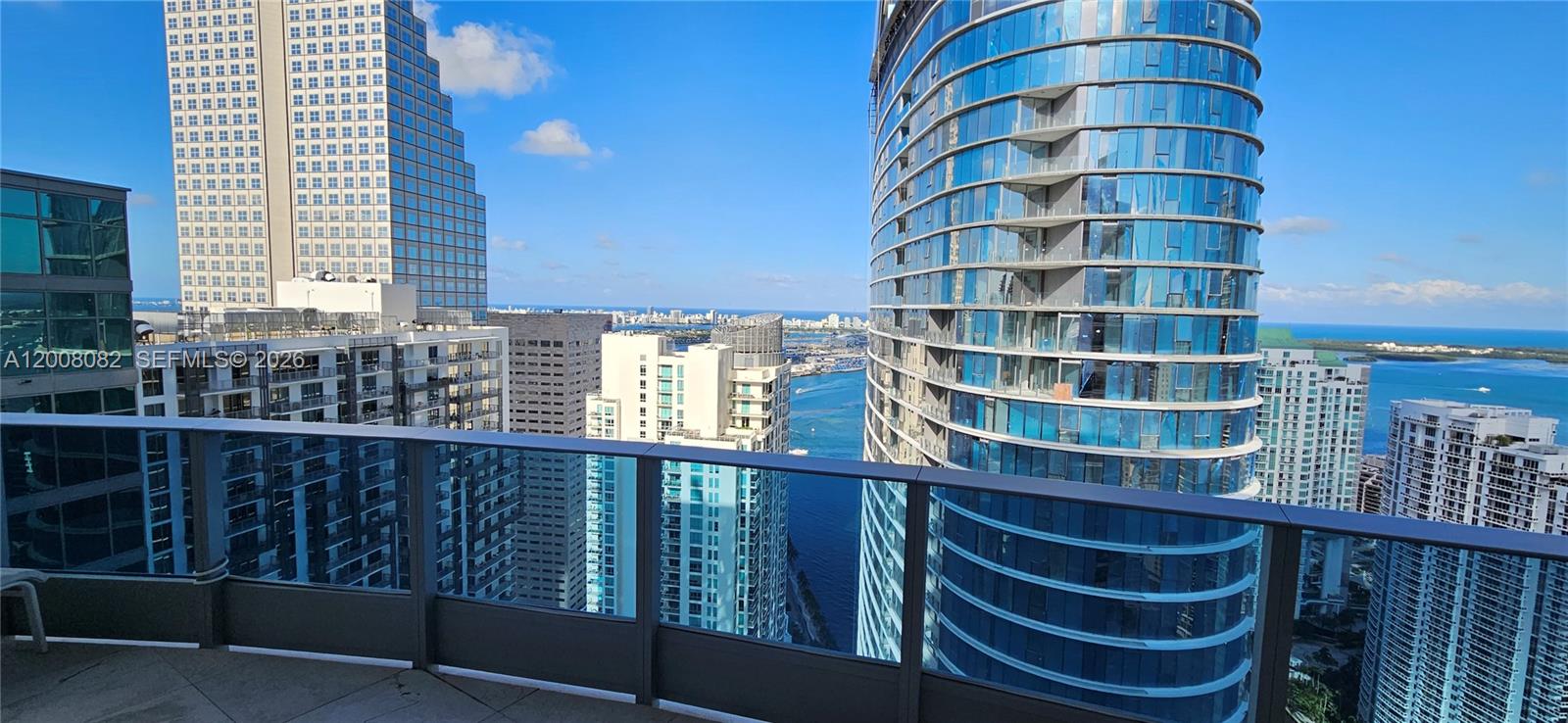 200 Biscayne Blvd Way, Unit 5001 Miami, FL 33131 - Photo 49 of 53 a view of balcony with a potted plant