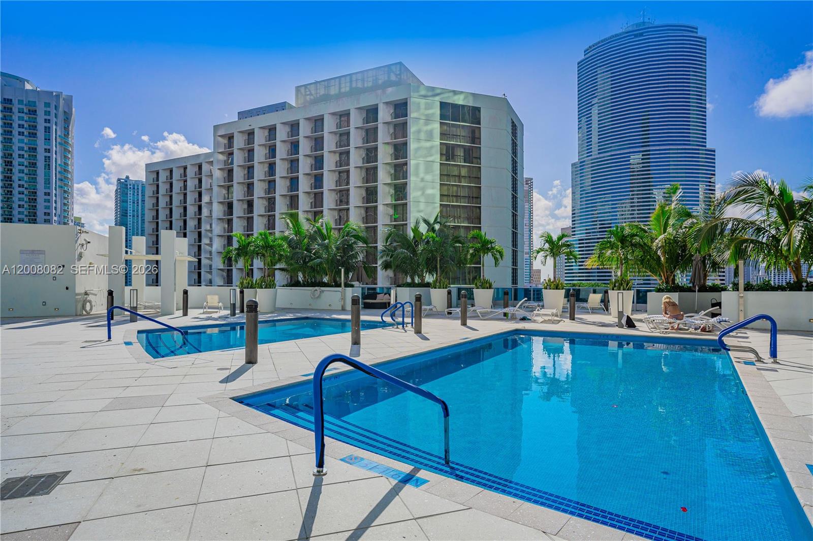 200 Biscayne Blvd Way, Unit 5001 Miami, FL 33131 - Photo 51 of 53 a swimming pool with outdoor seating and yard