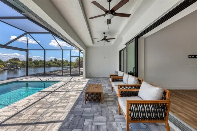 a outdoor space with lots of chairs and a couch