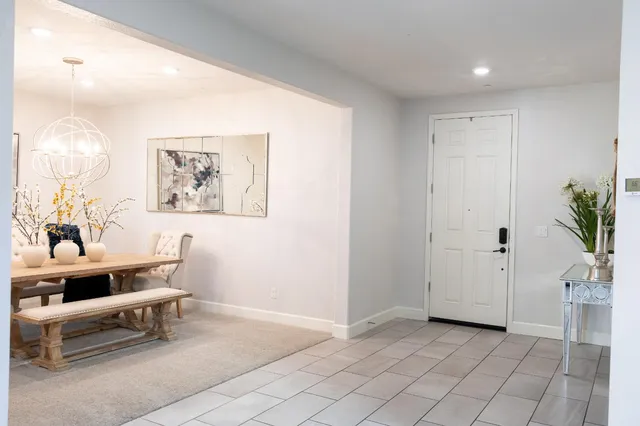 a view of room with furniture and wooden floor