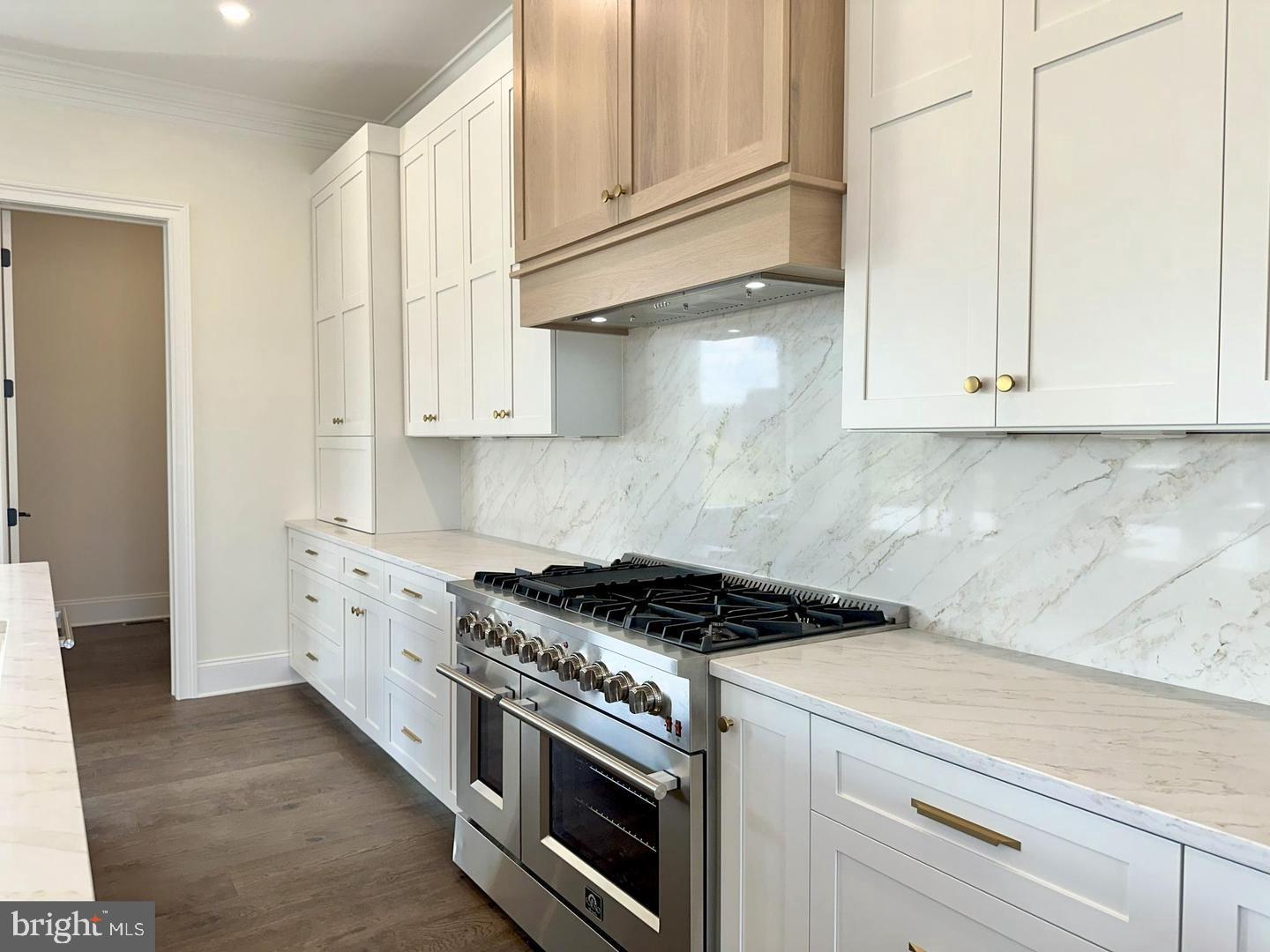 376 Spring Haven Drive Lancaster, PA 17601 - Photo 13 of 33 a kitchen with stainless steel appliances granite countertop white cabinets and a stove