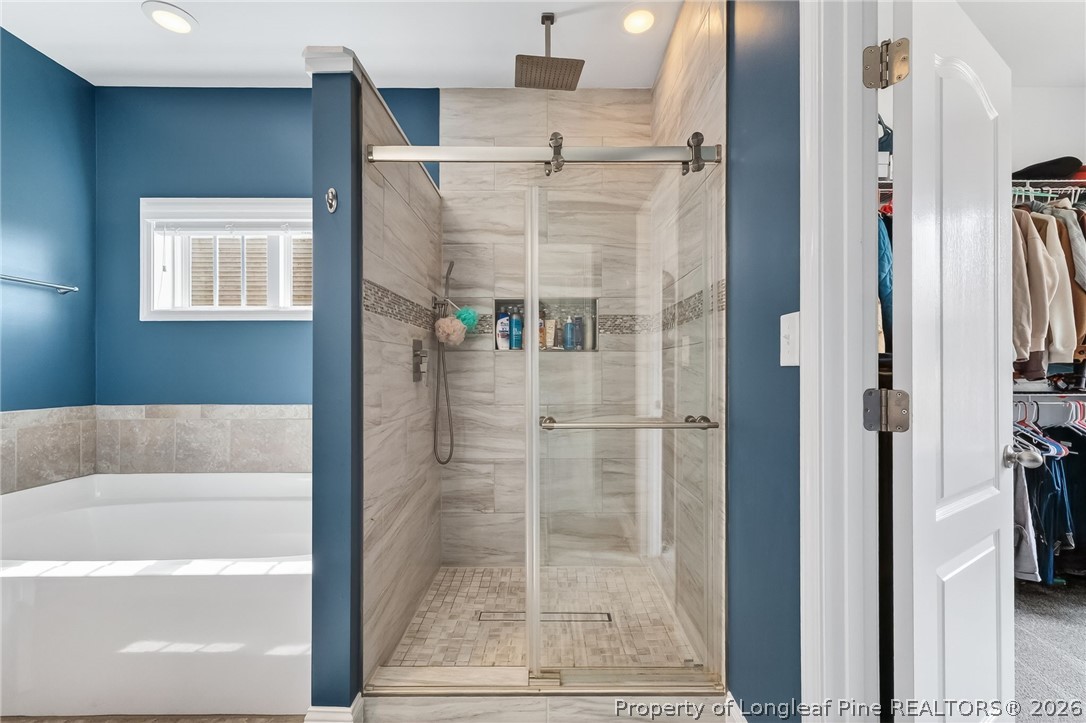 5129 Carson Allen Road Hope Mills, NC 28348 - Photo 21 of 50 a bathroom with a shower