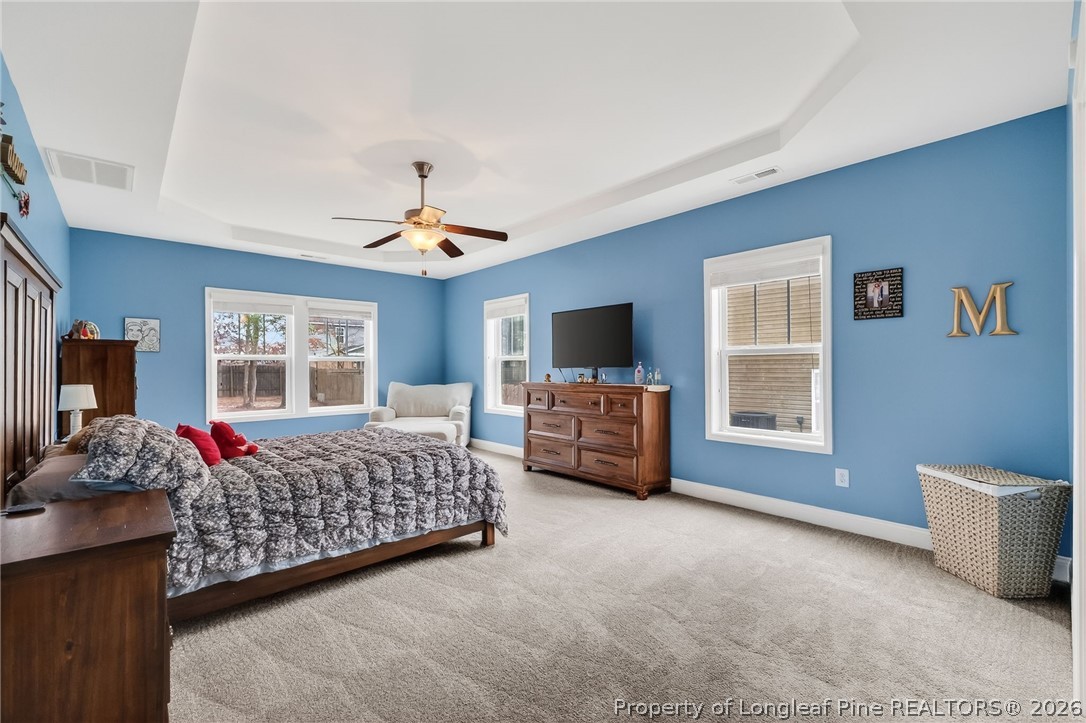 5129 Carson Allen Road Hope Mills, NC 28348 - Photo 22 of 50 a bedroom with bed and window