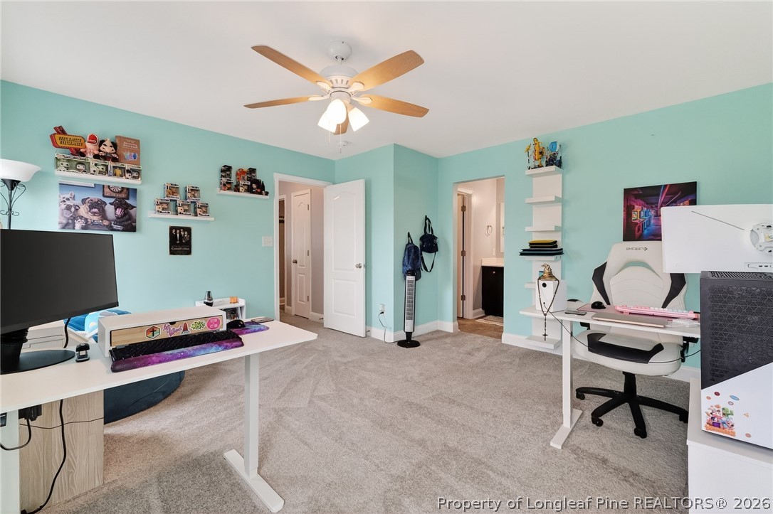 5129 Carson Allen Road Hope Mills, NC 28348 - Photo 30 of 50 a bedroom with furniture and a window