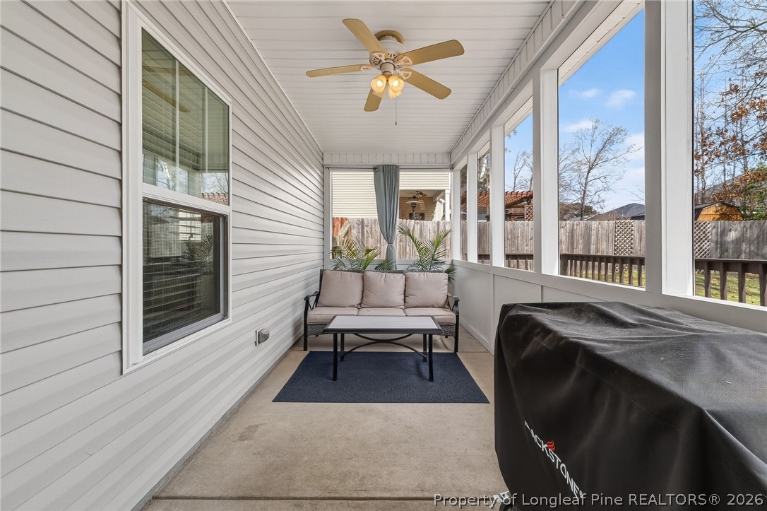 5129 Carson Allen Road Hope Mills, NC 28348 - Photo 36 of 50 a balcony with furniture and a potted plant