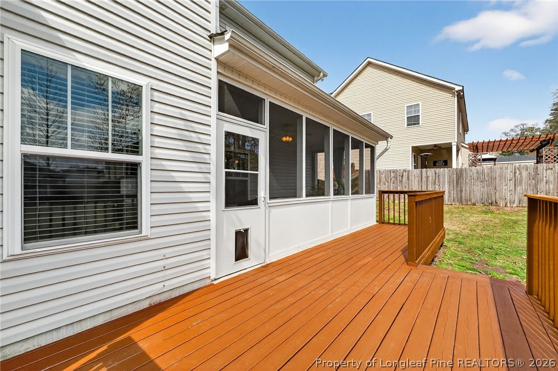 5129 Carson Allen Road Hope Mills, NC 28348 - Photo 38 of 50 a view of house with deck and outdoor kitchen