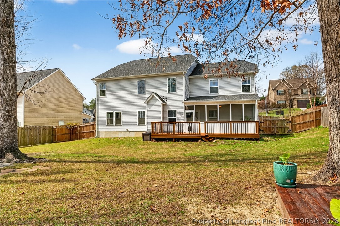 5129 Carson Allen Road Hope Mills, NC 28348 - Photo 42 of 50 a front view of a house with a garden