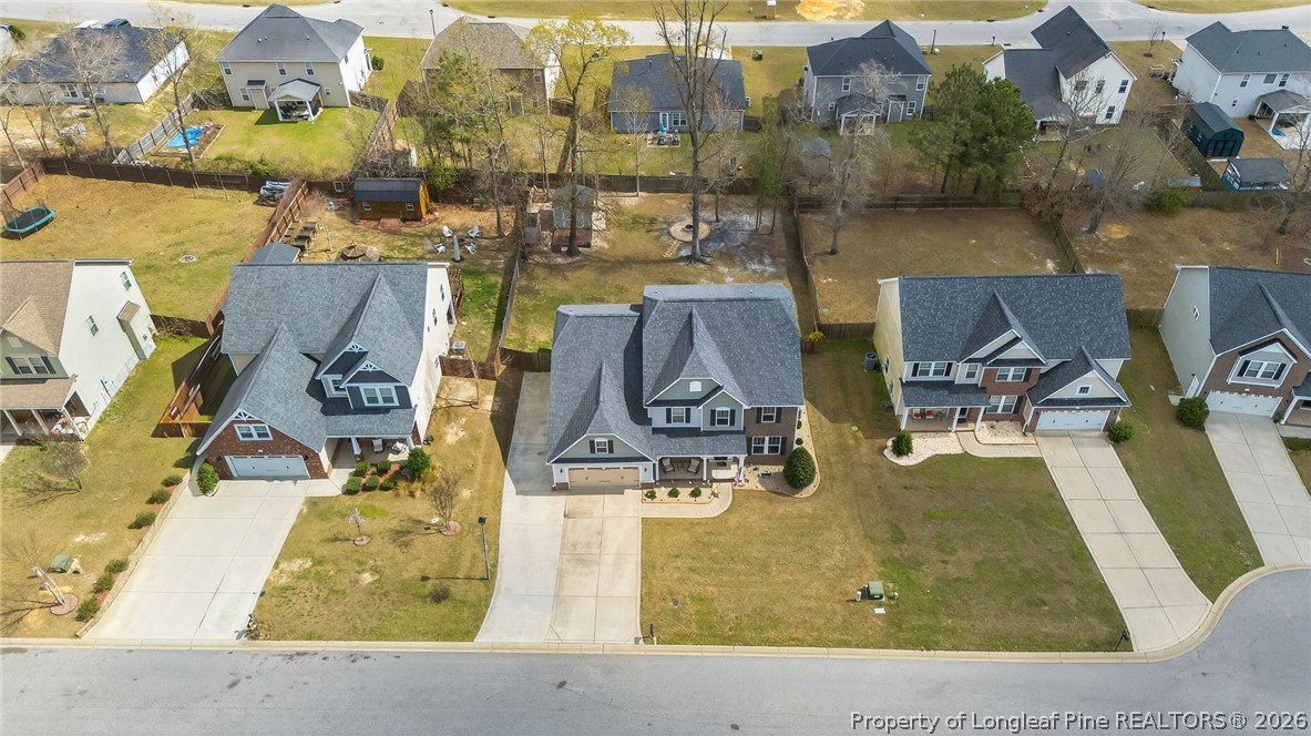 5129 Carson Allen Road Hope Mills, NC 28348 - Photo 50 of 50 an aerial view of a house with outdoor space