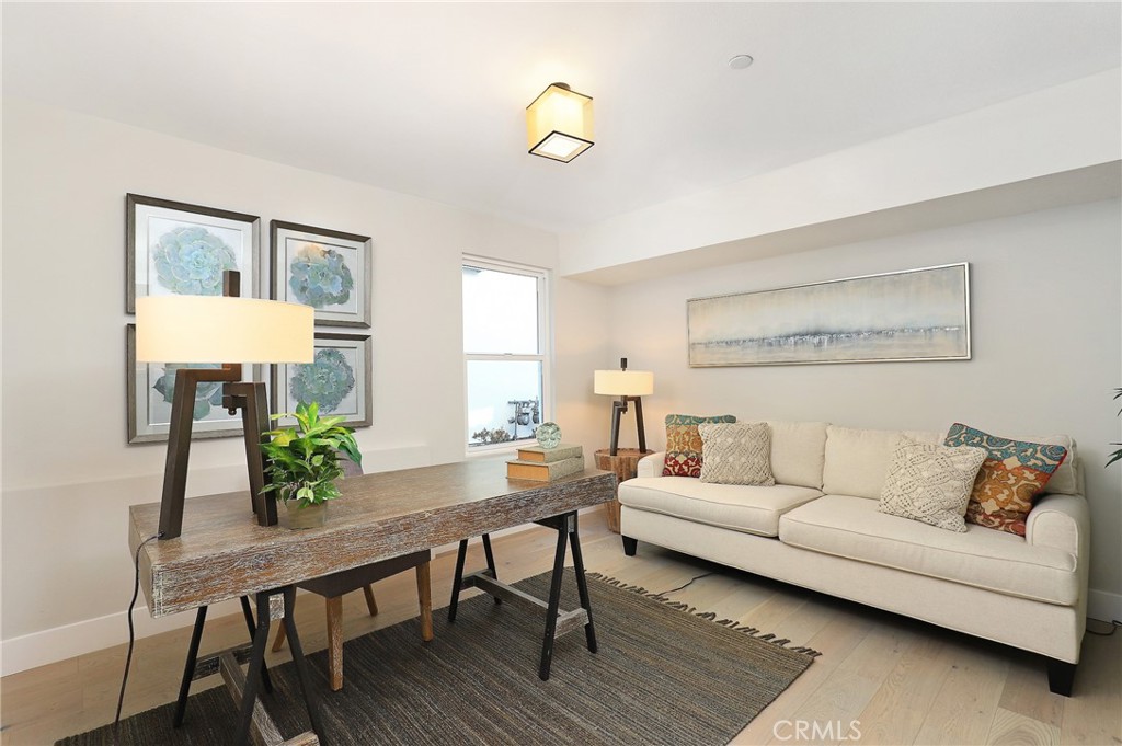 9 Turnberry Lane Phillips Ranch, CA 91766 - Photo 48 of 63 a living room with furniture and wooden floor