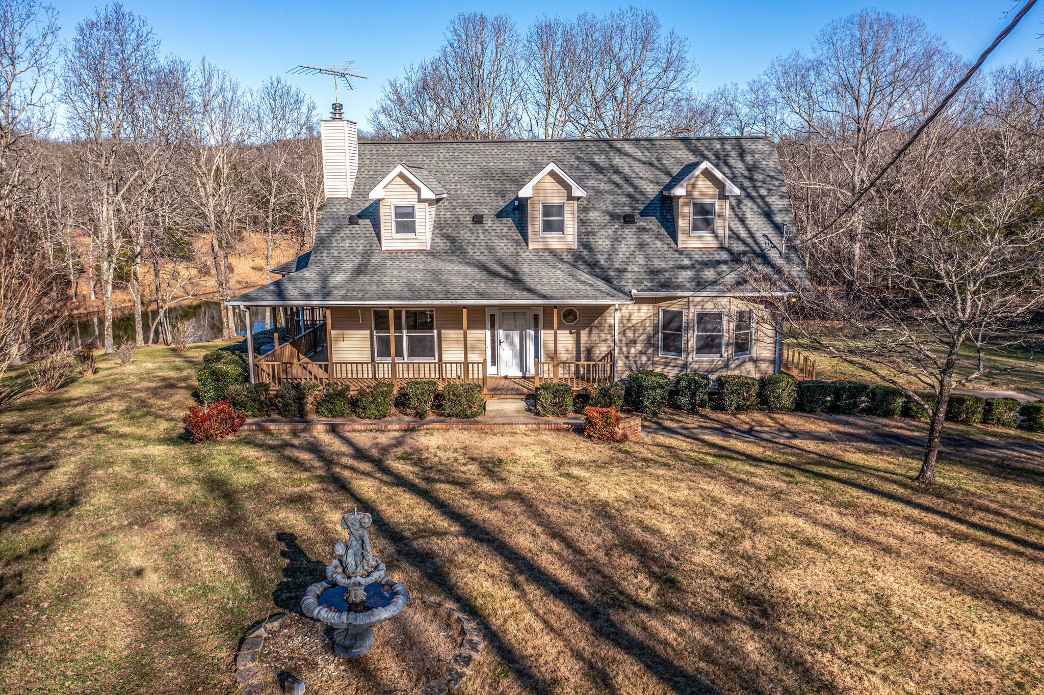 851 Roy Donegan Road Dickson, TN 37055 - Photo 4 of 51 a front view of a house with a yard