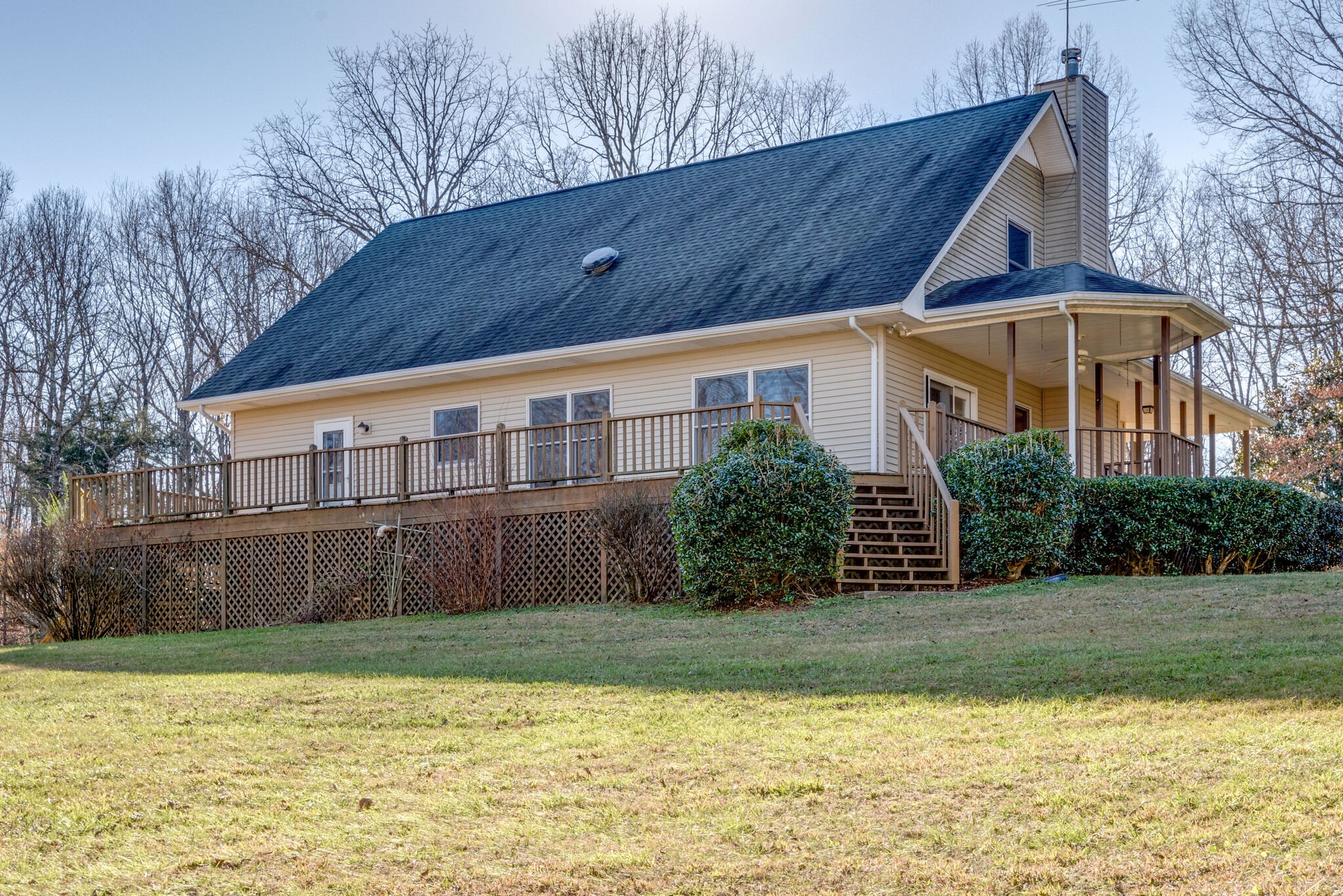 851 Roy Donegan Road Dickson, TN 37055 - Photo 5 of 51 a front view of a house with a yard and swimming pool