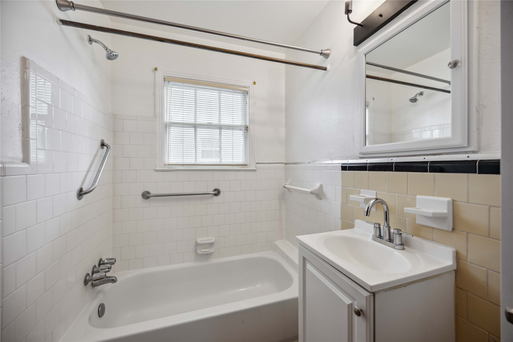 3729 Griggs Road Houston, TX 77021 - Photo 13 of 26 a bathroom with a sink mirror toilet and bathtub