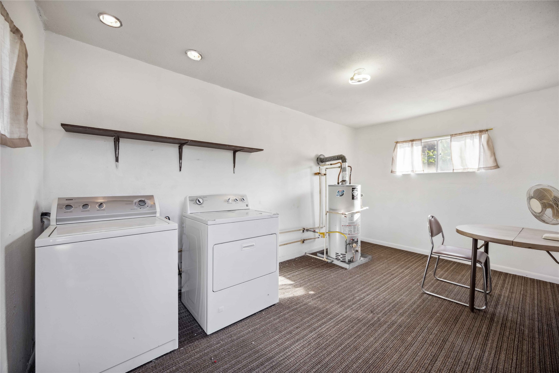 3729 Griggs Road Houston, TX 77021 - Photo 20 of 26 a view of storage and utility room with a window