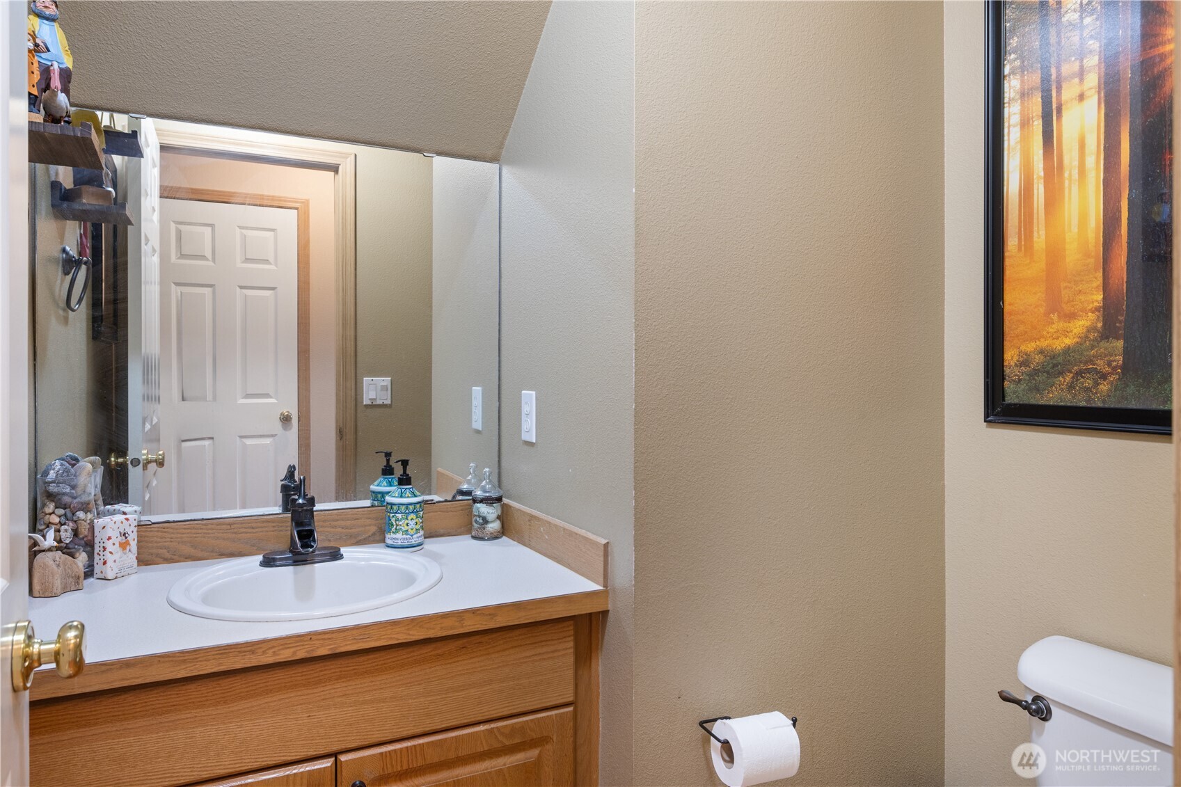 263 Hamilton Court Buckley, WA 98321 - Photo 15 of 35 a bathroom with a sink and a mirror