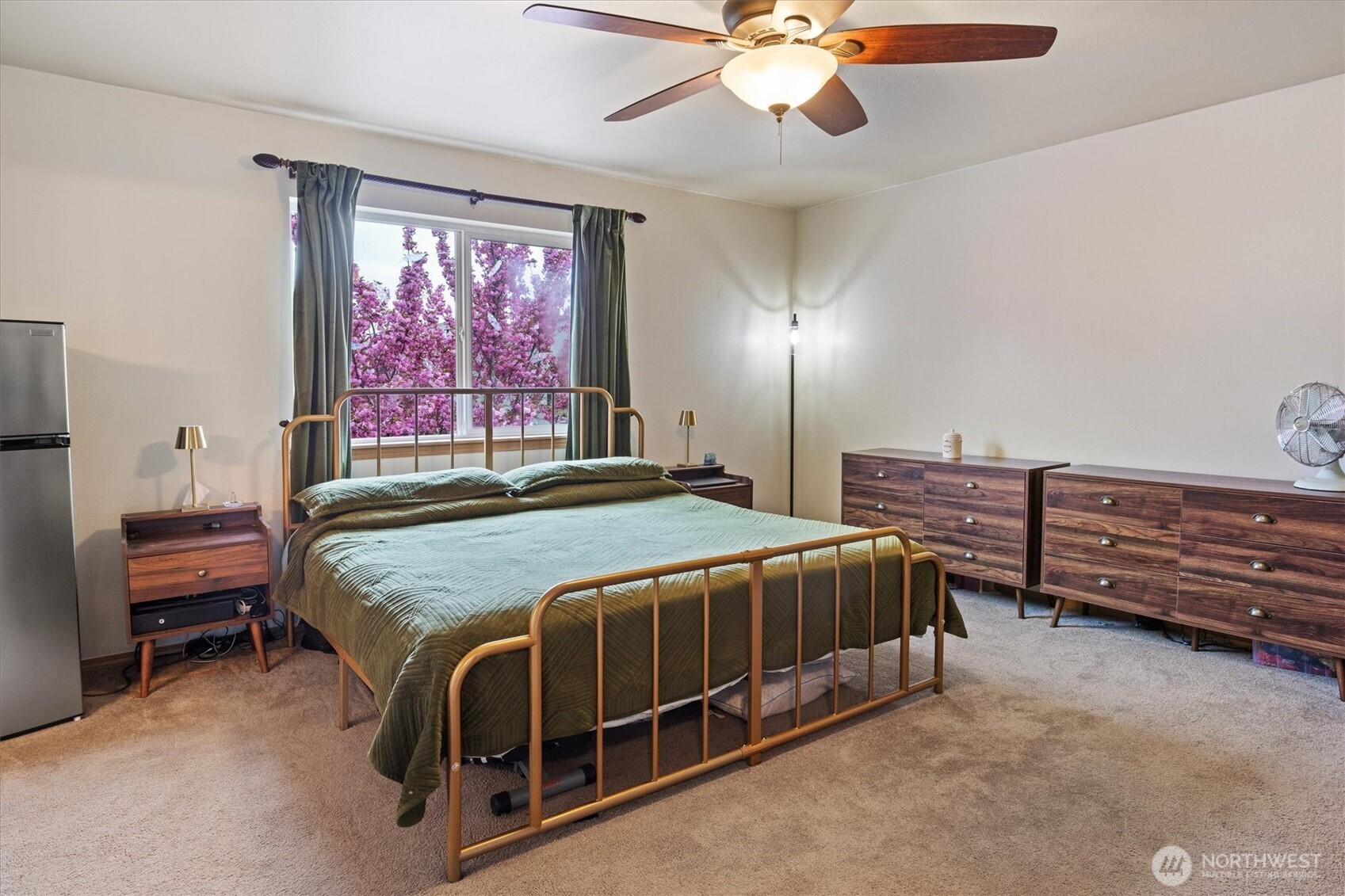 263 Hamilton Court Buckley, WA 98321 - Photo 16 of 35 a bedroom with a bed and a chandelier