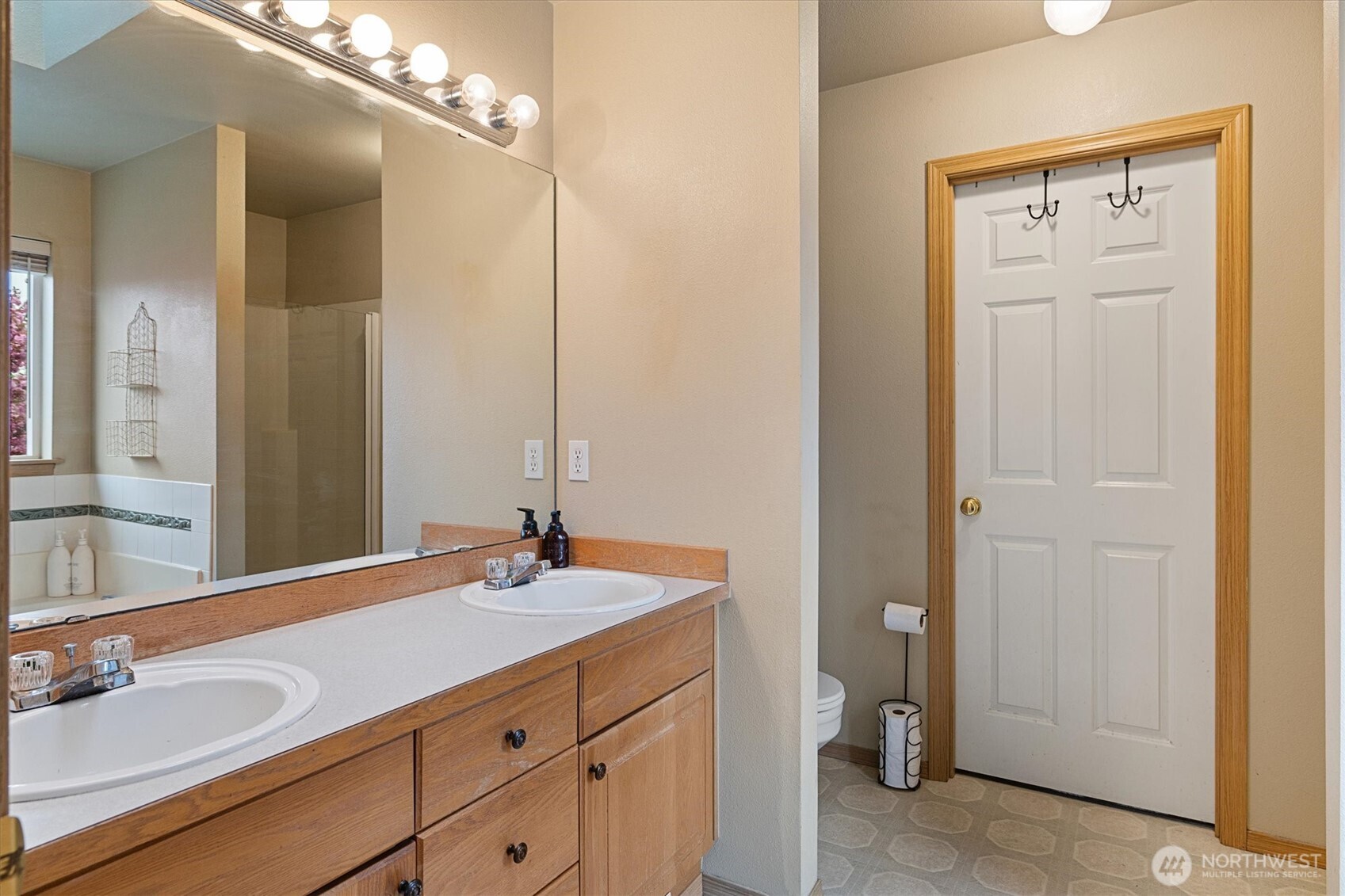 263 Hamilton Court Buckley, WA 98321 - Photo 17 of 35 a bathroom with a sink vanity and a mirror
