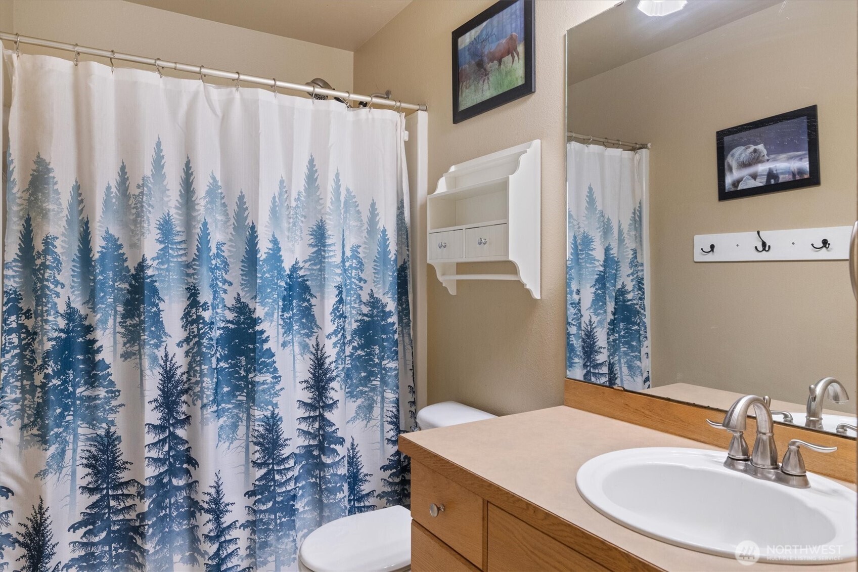 263 Hamilton Court Buckley, WA 98321 - Photo 23 of 35 a bathroom with a sink toilet and shower