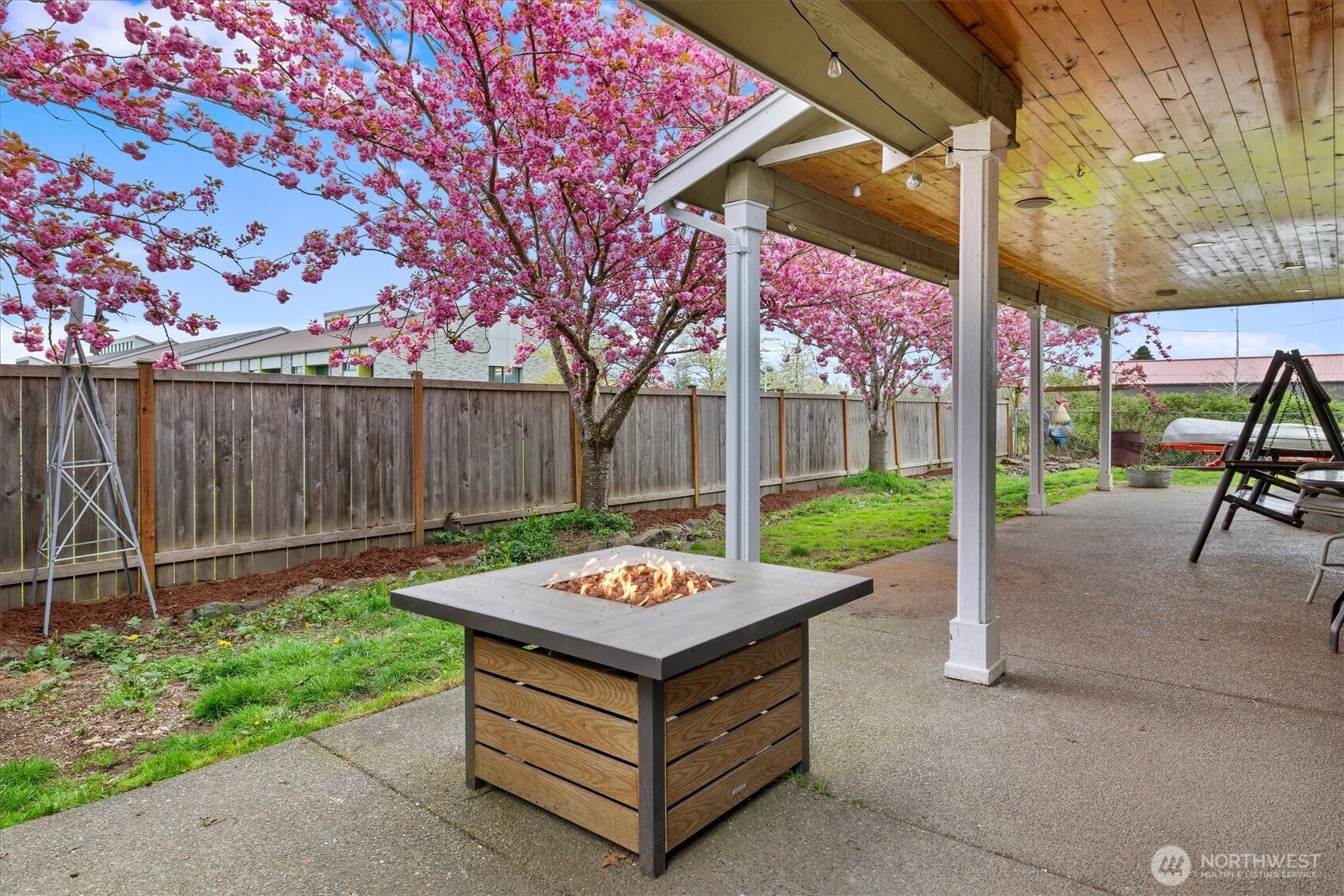263 Hamilton Court Buckley, WA 98321 - Photo 27 of 35 a wooden bench sitting in front of a house