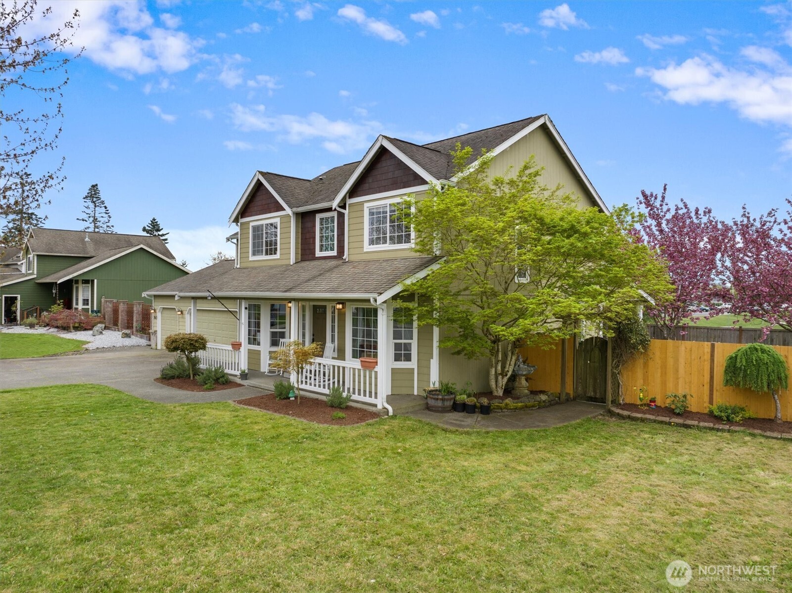 263 Hamilton Court Buckley, WA 98321 - Photo 32 of 35 a front view of a house with garden
