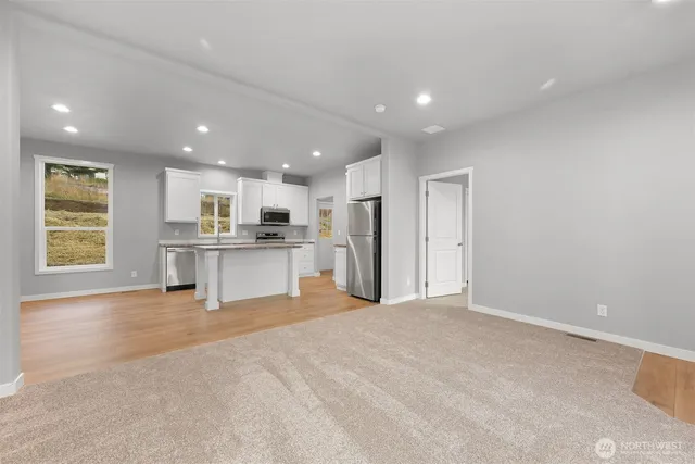 a view of a kitchen with a sink