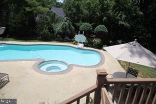210 Plush Mill Road Wallingford, PA 19086 - Photo 31 of 38 Deck overlooking Patio and Pool