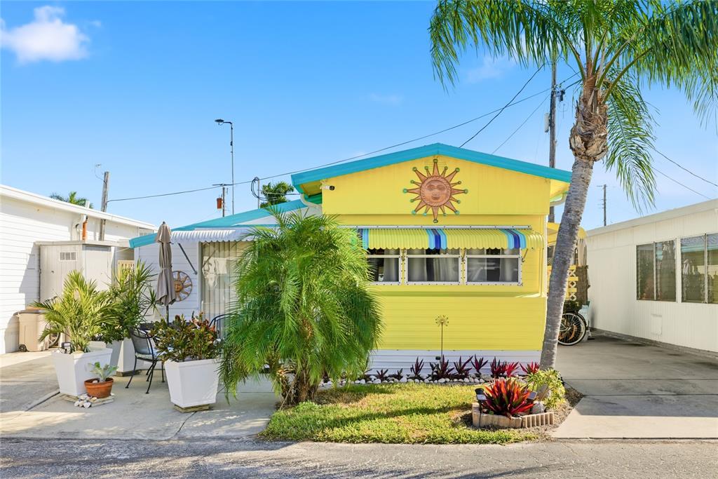 10315 Cortez Road West, Unit 142 Bradenton, FL 34210 - Photo 1 of 22 a view of a house with a backyard