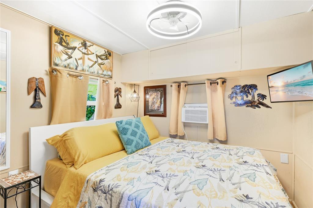 10315 Cortez Road West, Unit 142 Bradenton, FL 34210 - Photo 11 of 22 a bedroom with a bed and a window