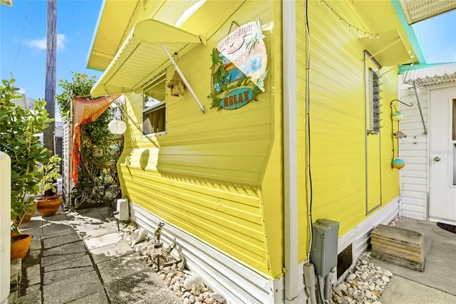 a view of a door of the house with a street