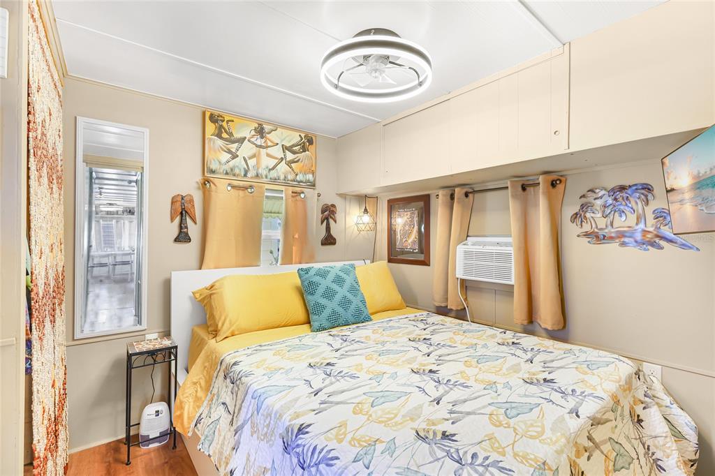 10315 Cortez Road West, Unit 142 Bradenton, FL 34210 - Photo 10 of 22 a bedroom with a large bed and a window