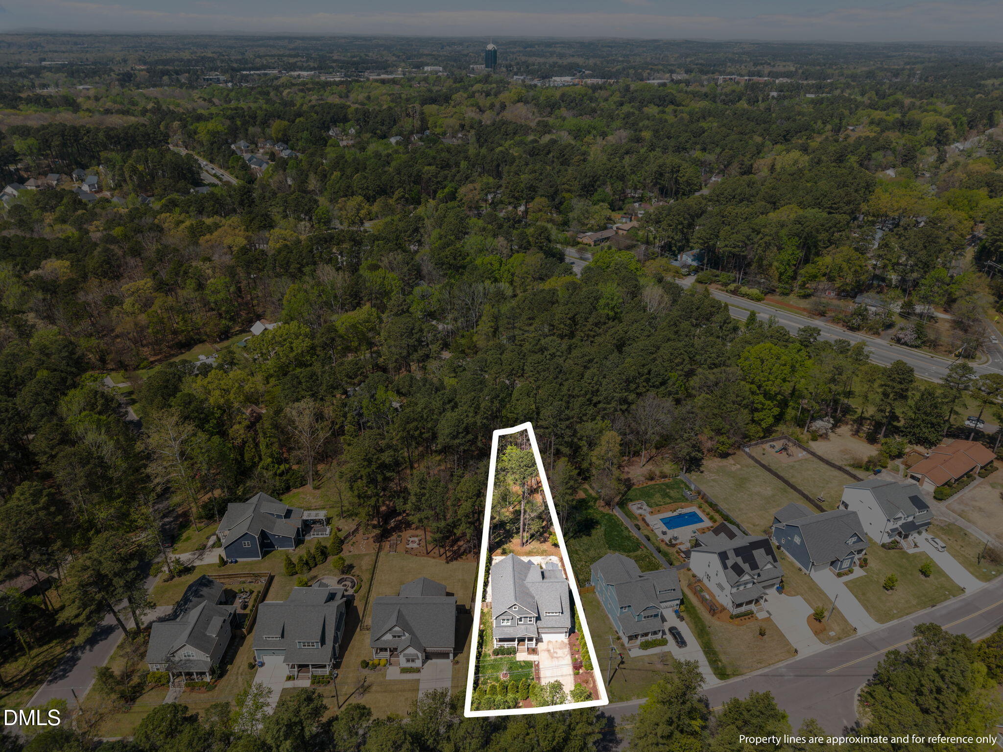 3426 Dixon Road Durham, NC 27707 - Photo 35 of 37 an aerial view of a residential houses with city view