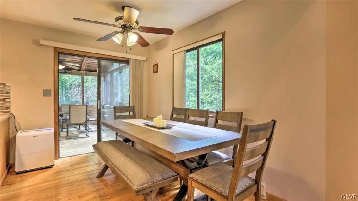 1017 Clover Road Long Pond, PA 18334 - Photo 13 of 45 a view of a dining room with furniture window and outside view