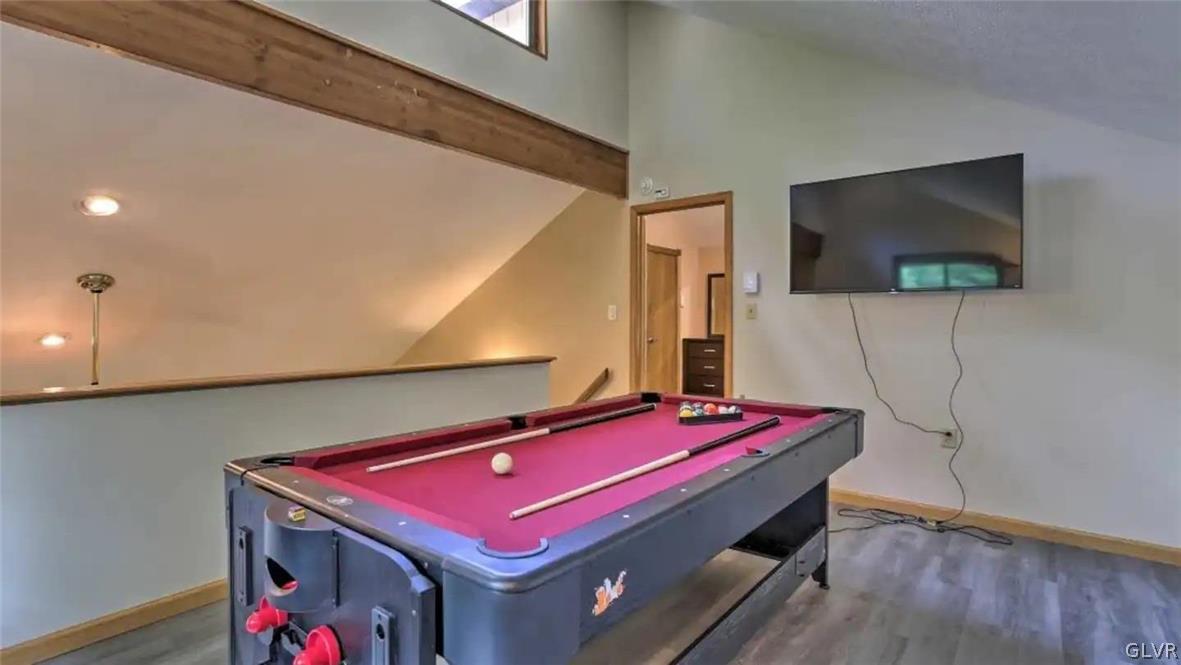 1017 Clover Road Long Pond, PA 18334 - Photo 14 of 45 a room with pool table and a flat screen tv