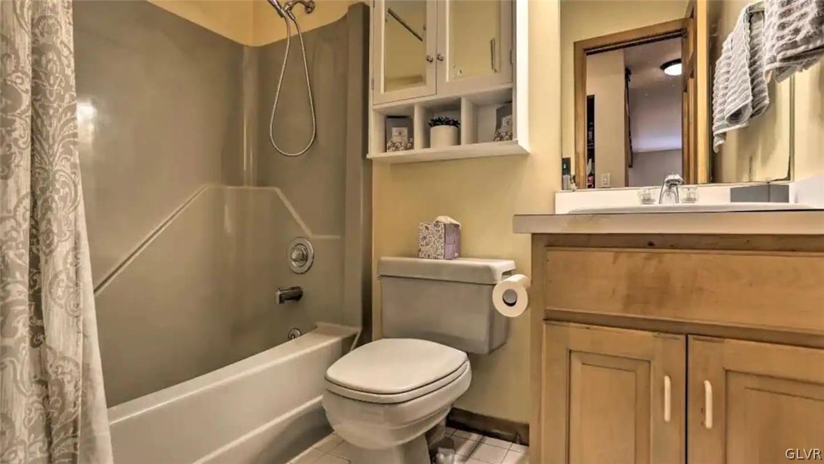 1017 Clover Road Long Pond, PA 18334 - Photo 25 of 45 a bathroom with a sink a toilet and shower