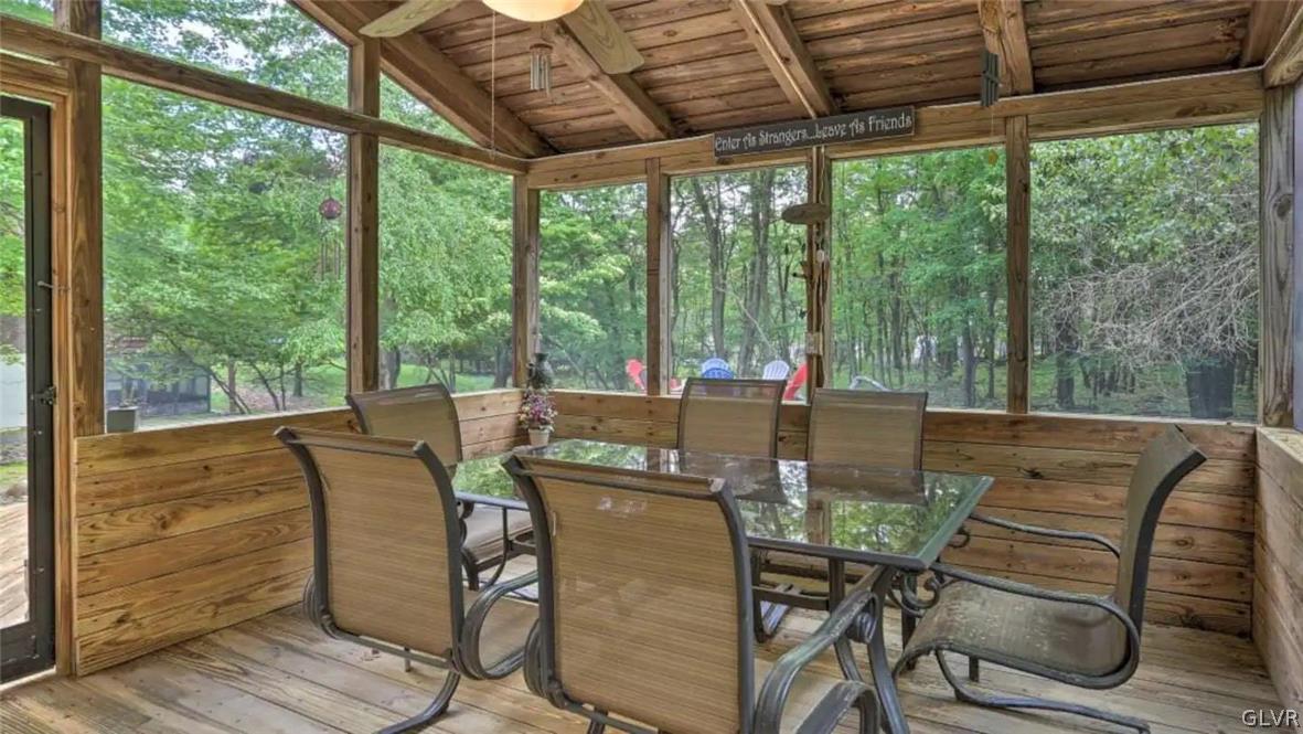 1017 Clover Road Long Pond, PA 18334 - Photo 28 of 45 a view of an outdoor dining space with furniture and wooden floor