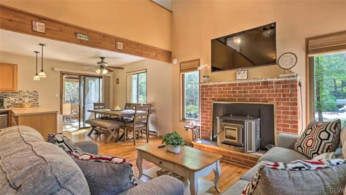 1017 Clover Road Long Pond, PA 18334 - Photo 5 of 45 a living room with furniture and a fireplace