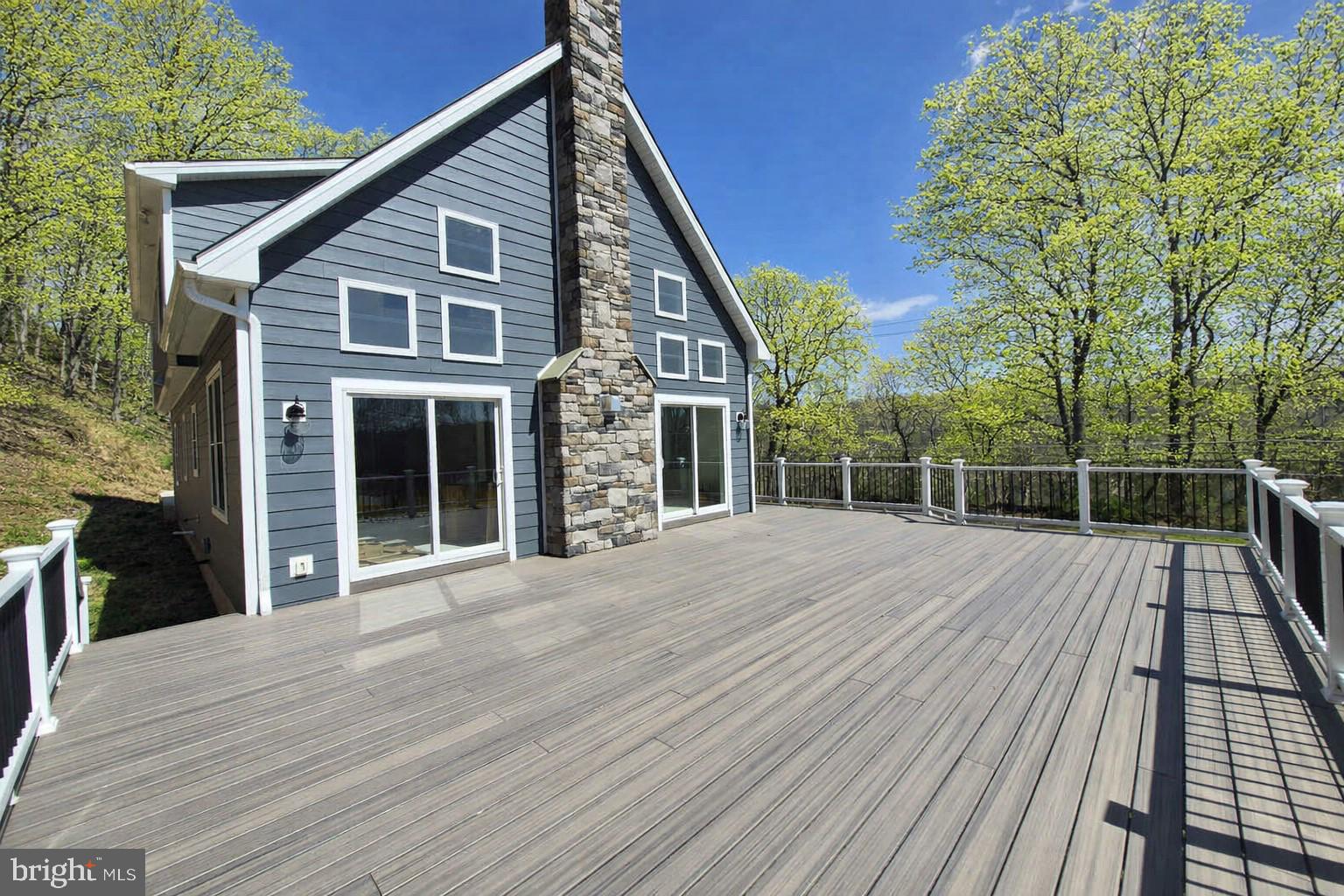 759 River Road Erwinna, PA 18920 - Photo 7 of 46 a view of backyard with deck and seating area