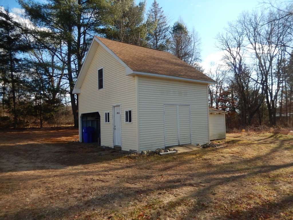 10 Hospital Road Monson, MA 01057 - Photo 15 of 17 a view of a house with a yard