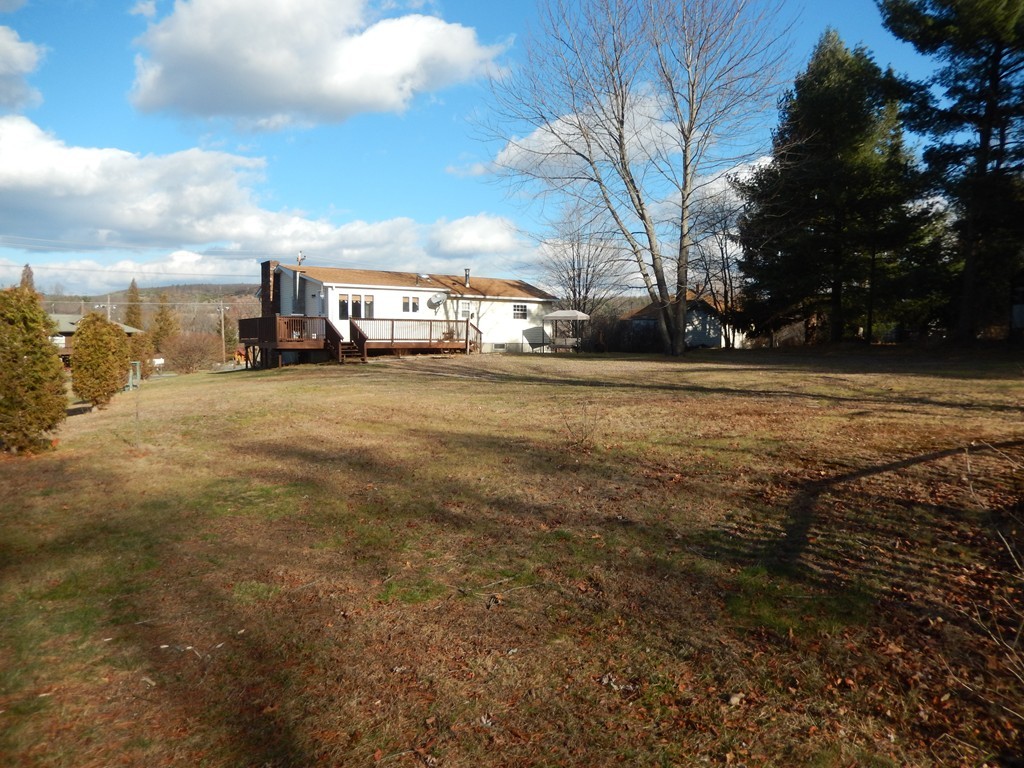 10 Hospital Road Monson, MA 01057 - Photo 16 of 17 a view of a big house with a big yard