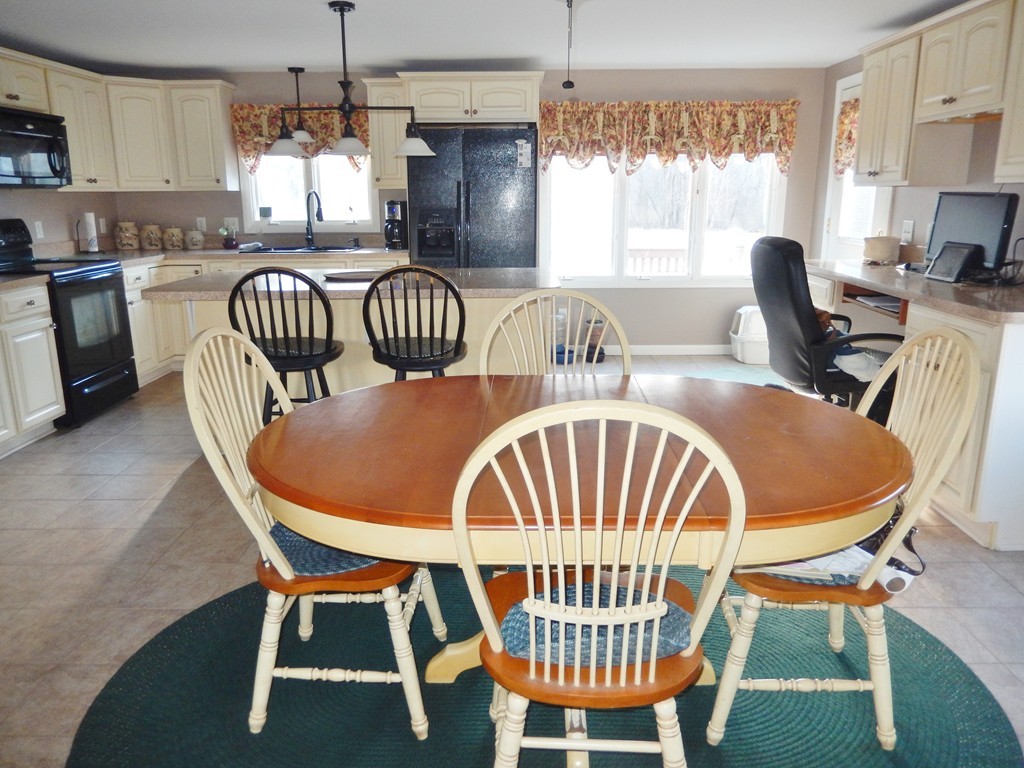 10 Hospital Road Monson, MA 01057 - Photo 4 of 17 a view of a dining room with furniture window and outside view