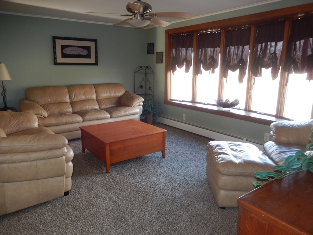 10 Hospital Road Monson, MA 01057 - Photo 5 of 17 a living room with furniture and a large window
