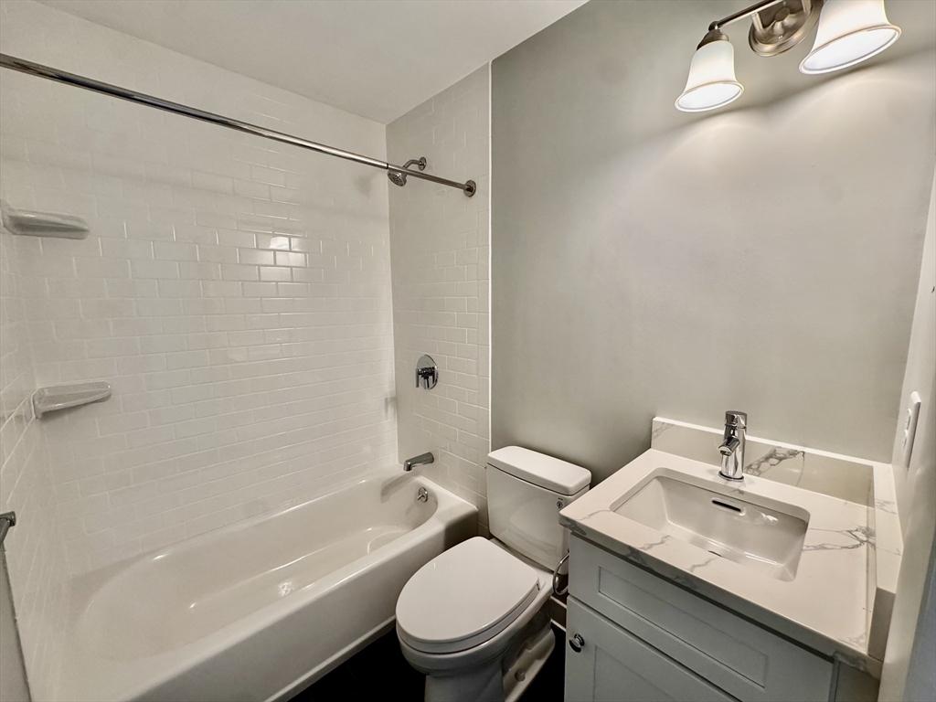 97 Spring Street, Unit A5 Boston, MA 02132 - Photo 3 of 5
