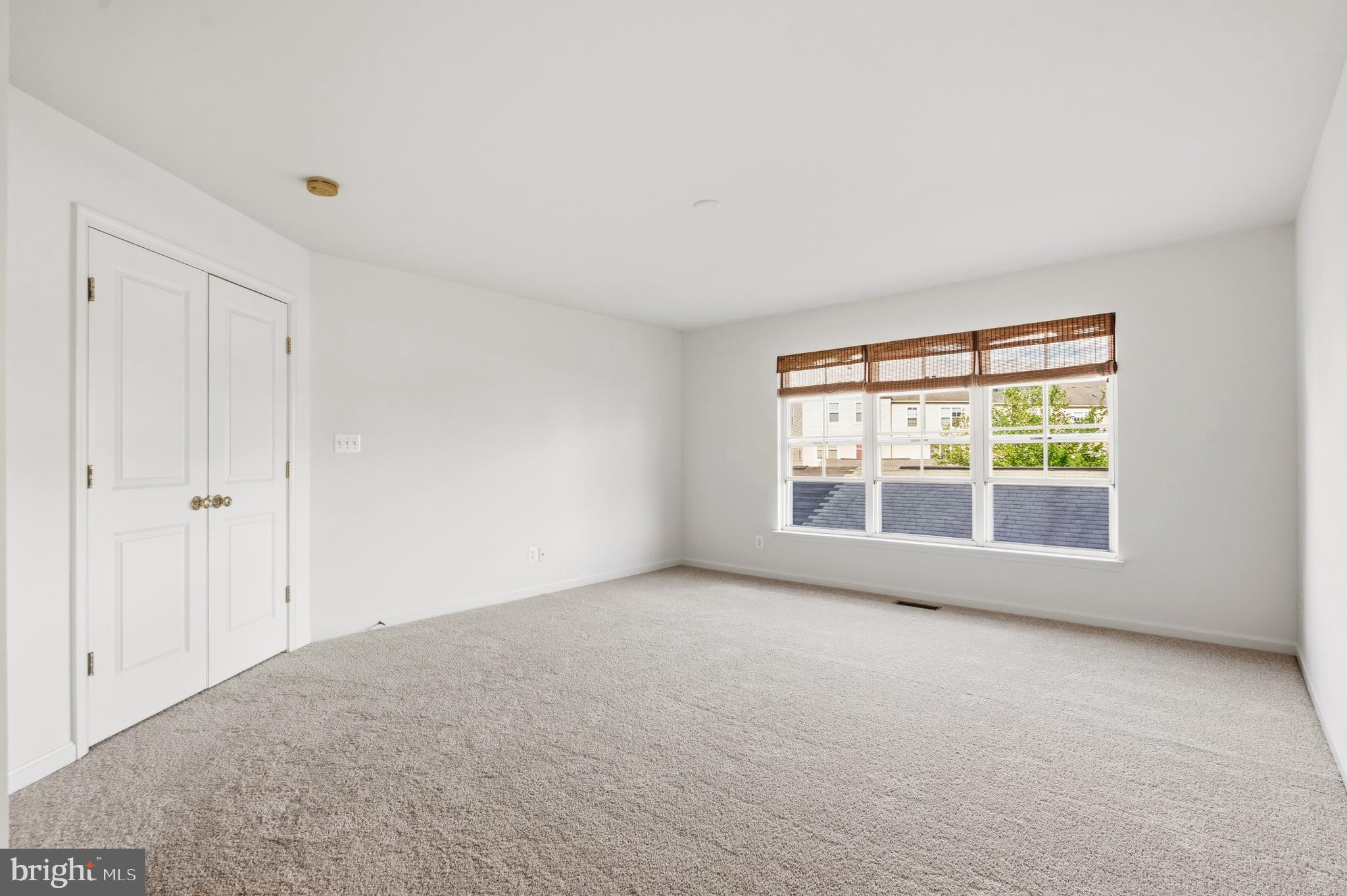 9227 Ribbon Falls Loop Bristow, VA 20136 - Photo 36 of 53 a view of an empty room with a window