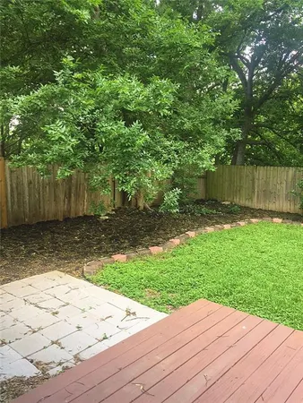 a view of a backyard with a small cabin