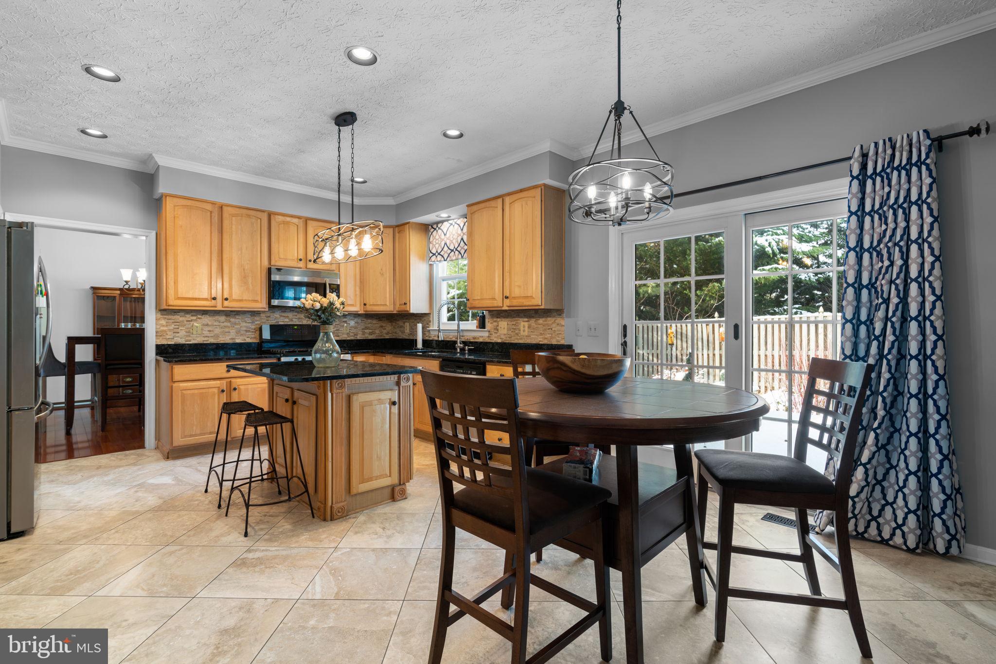 22 Dovefield Road Perry Hall, MD 21128 - Photo 12 of 46 a view of a dining room with furniture window and outside view