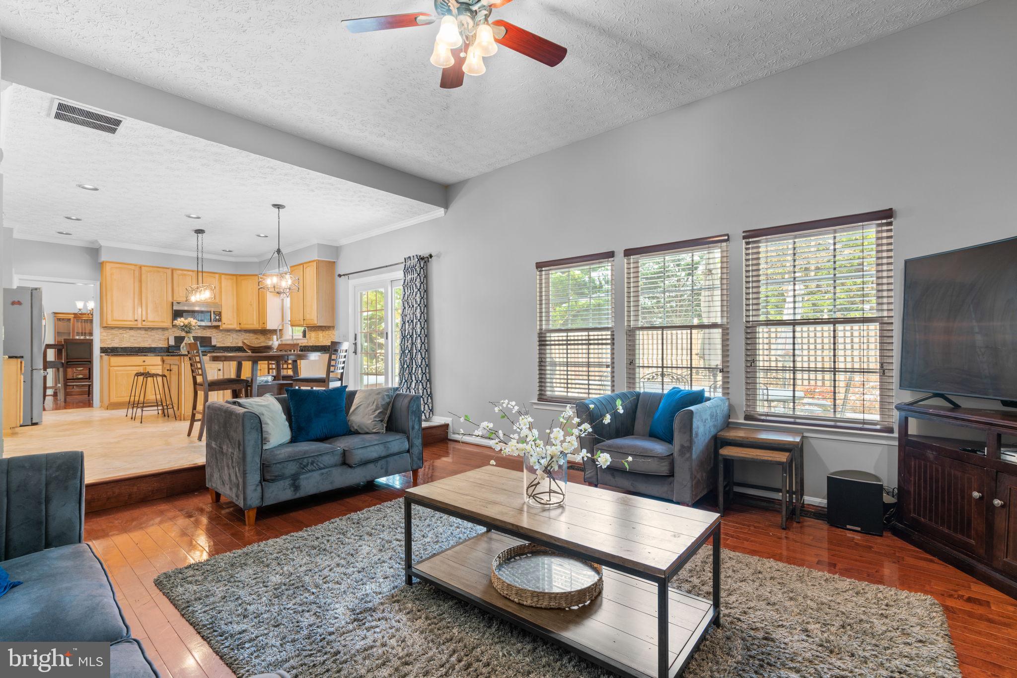 22 Dovefield Road Perry Hall, MD 21128 - Photo 15 of 46 a living room with furniture and a flat screen tv