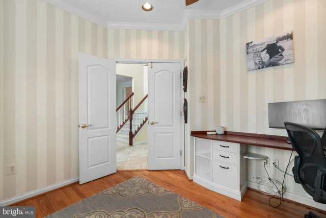 a view of kitchen with furniture and wooden floor
