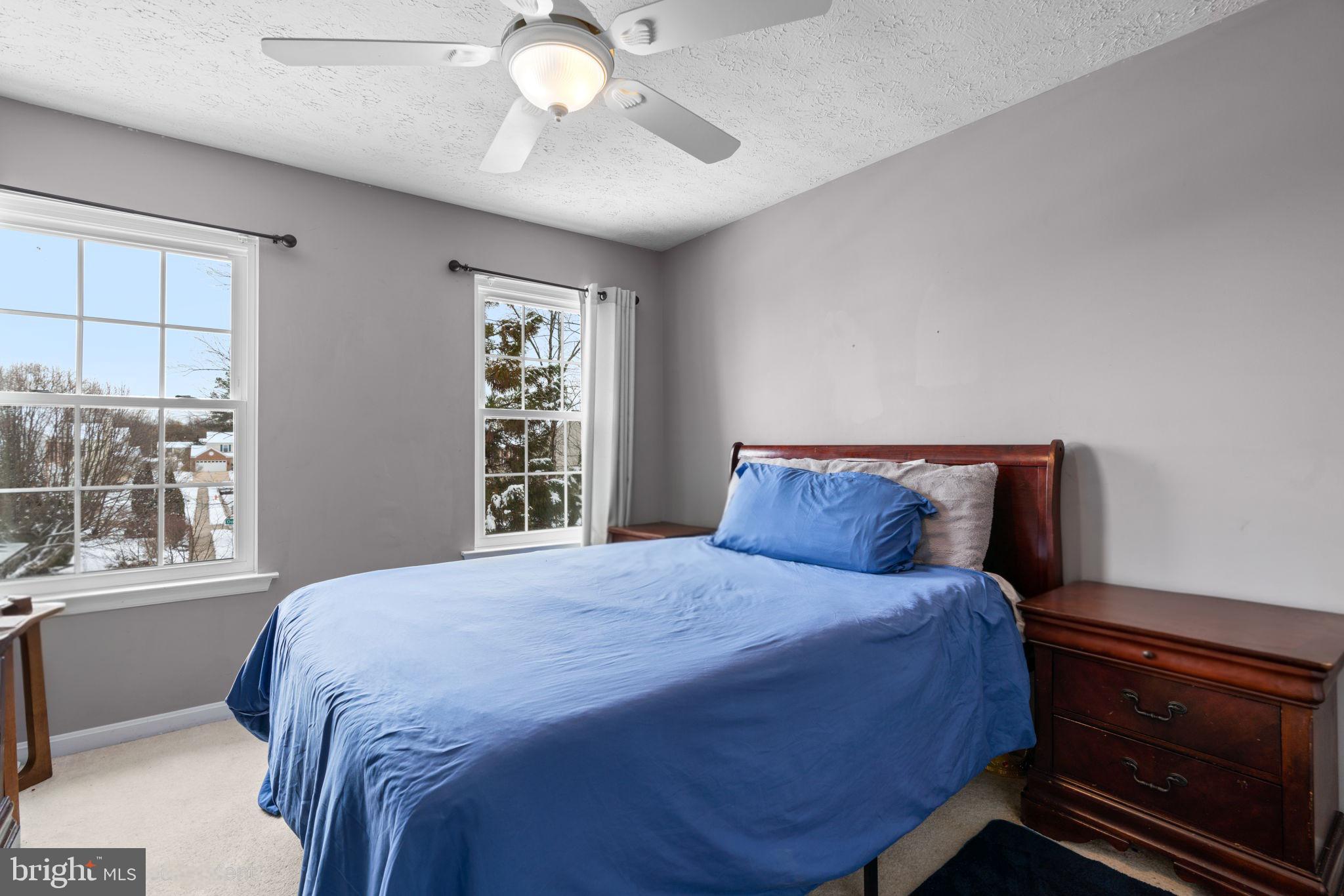 22 Dovefield Road Perry Hall, MD 21128 - Photo 26 of 46 a bedroom with a large bed and a window